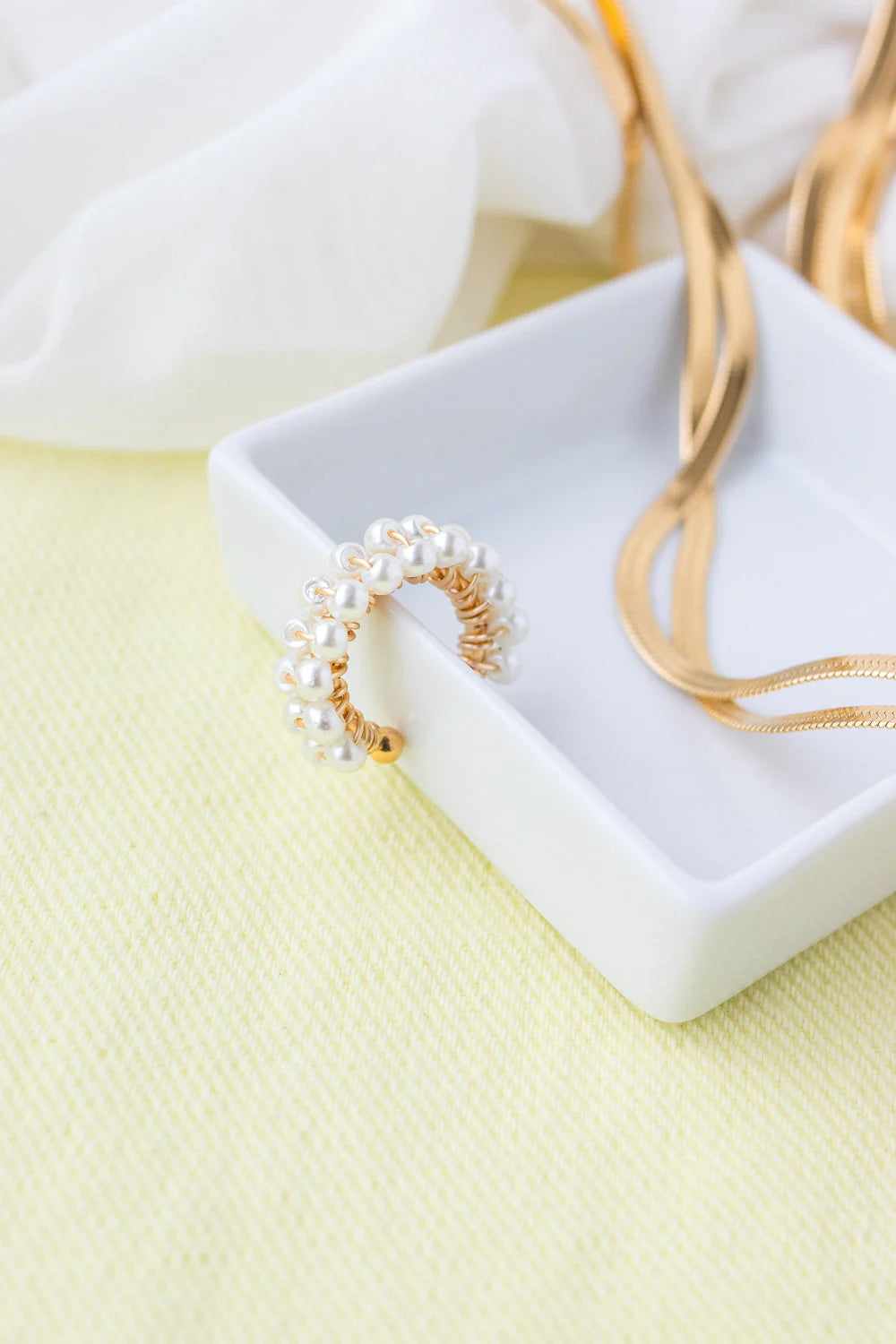 Earcuff tejido perla