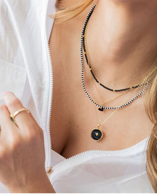 Set de collares corazon negro