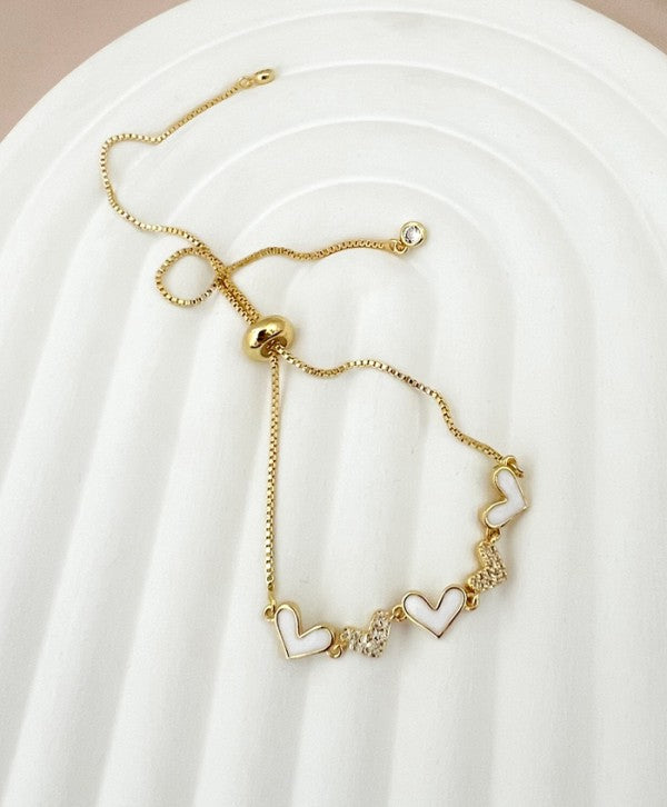 Pulsera charms de corazones