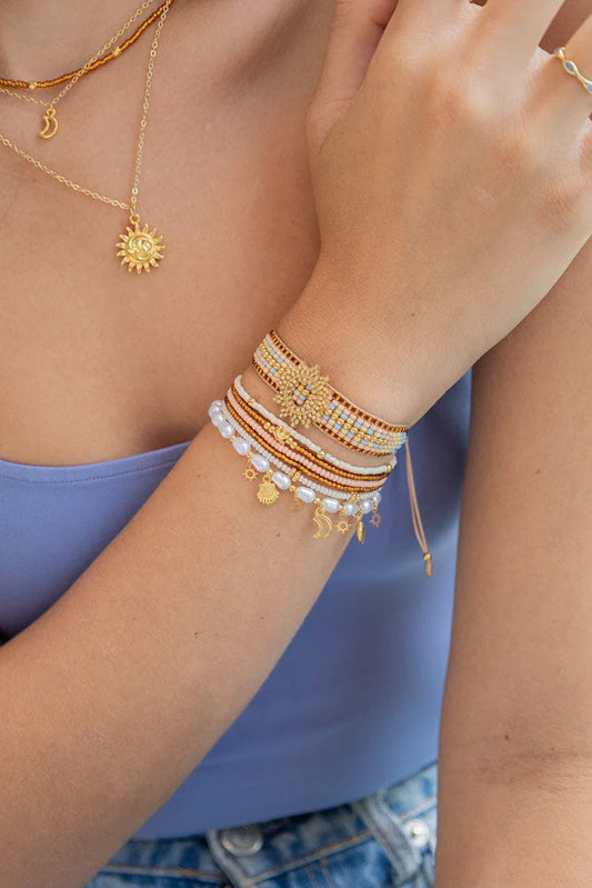 Set pulseras Doradas Sol