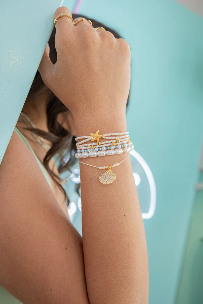 Set pulseras Playera Concha